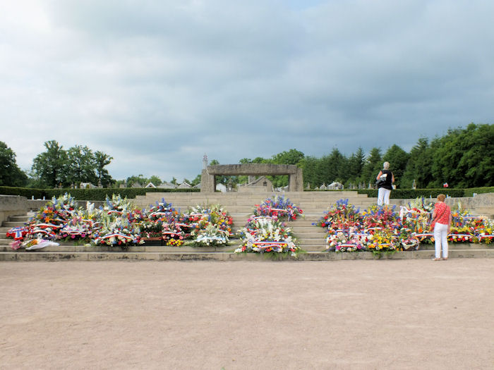 The tributes placed on the Crypt steps in Oradour-sur-Glane in 2014