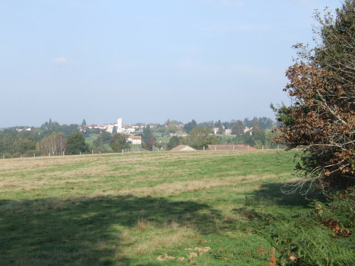 Distant view of Oradour old and new town from nearby to where the SS paused