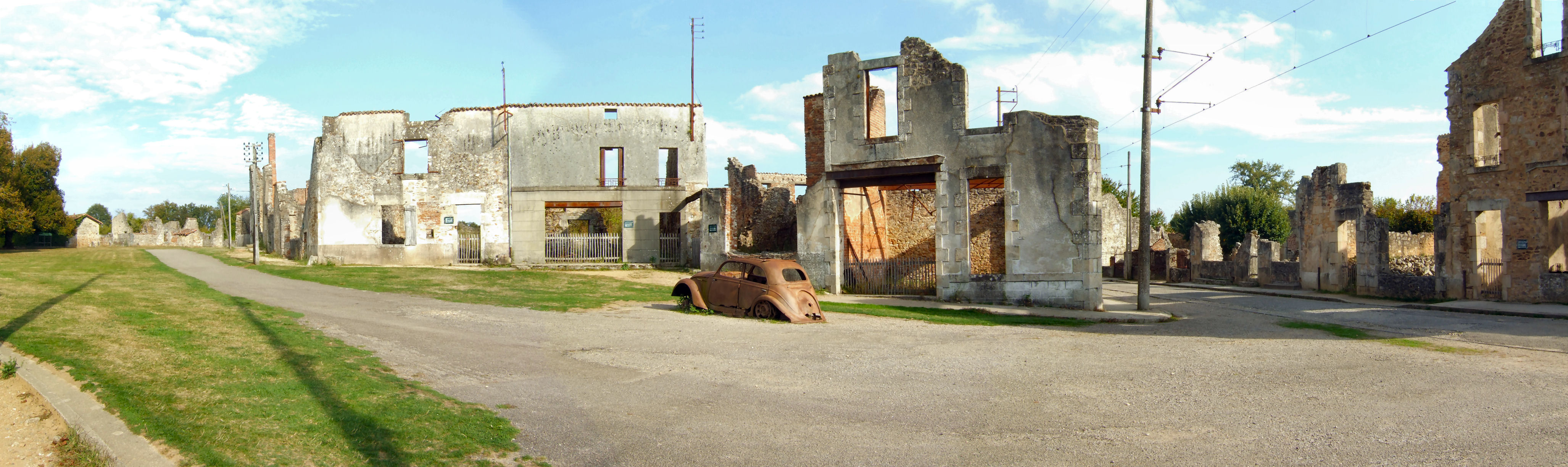 The Champ de Foire and the doctor's car at Oradour-sur-Glane looking south