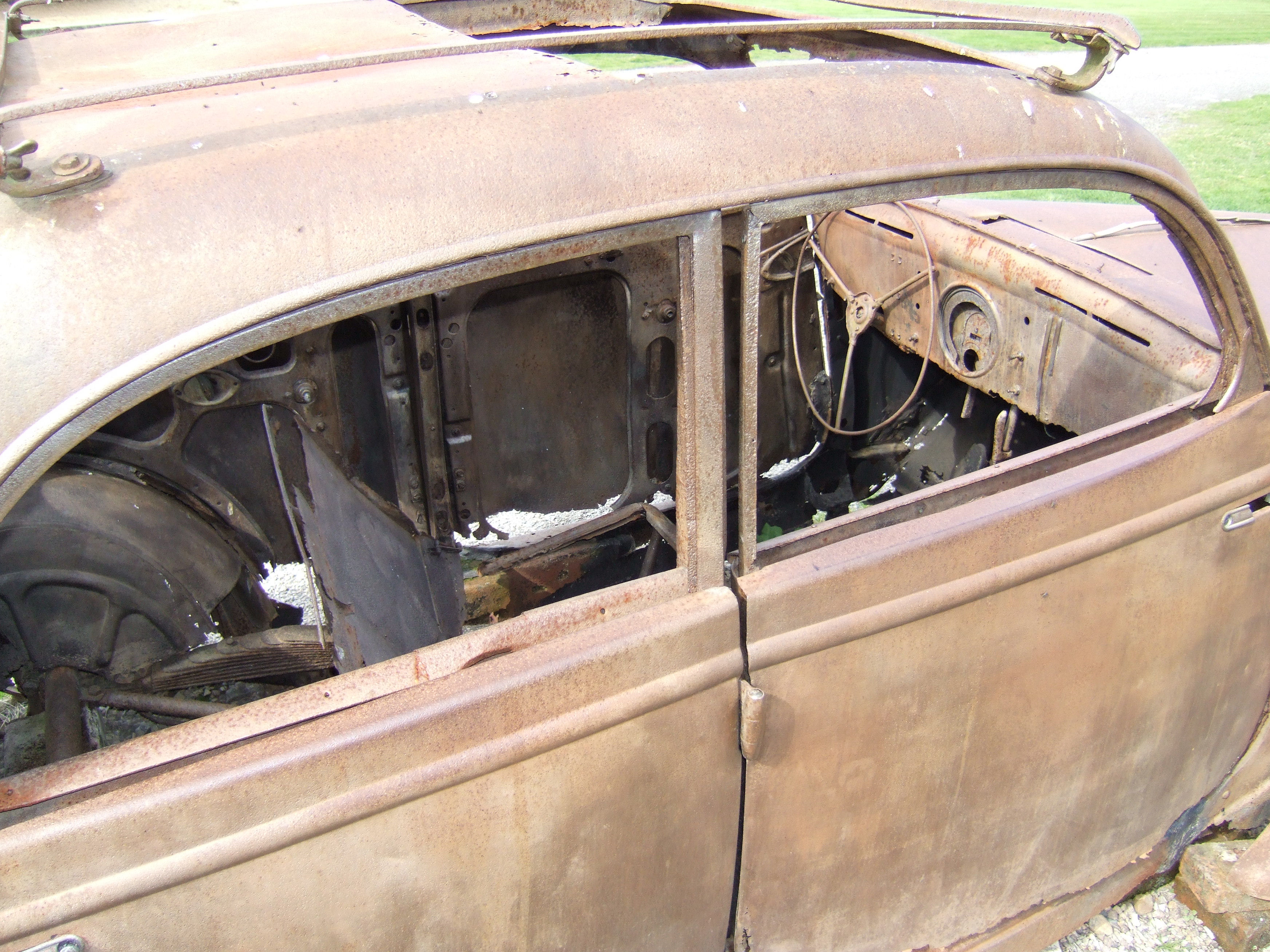 The interior of the Doctor's car on the Champ de Foire, Oradour-sur-Glane