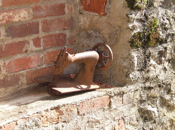 Sewing machine posed in a house at Oradour-sur-Glane