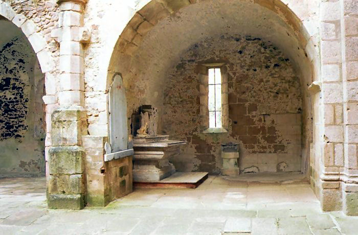 Memorial to W.W.I and window in church through which shots were fired into the chapel of St. Anne